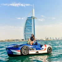 Mother and child enjoying jet car ride near Burj Al Arab in Dubai with eDrive Water Sports