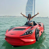 Woman enjoying jet car ride near Burj Al Arab in Dubai