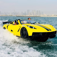Yellow jet car speeding across the water with Dubai skyline in the background